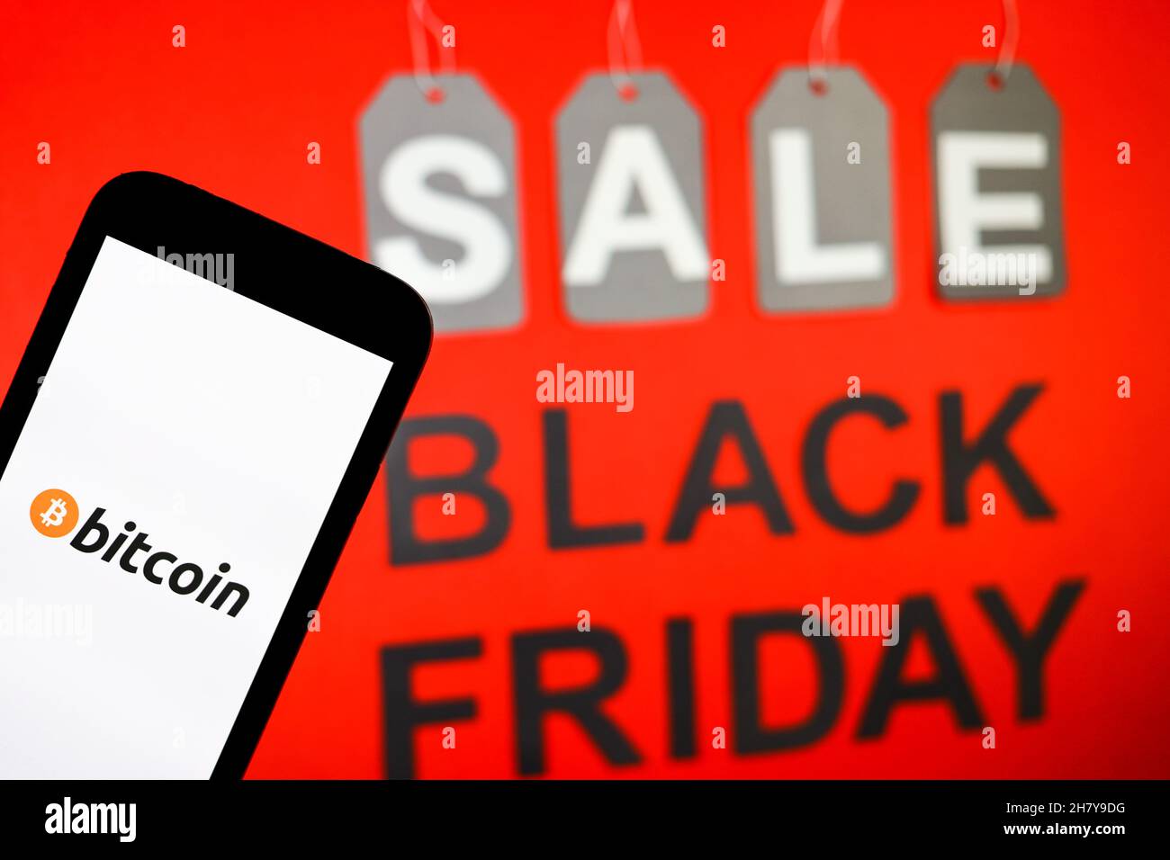 Bitcoin logo seen displayed on a smartphone Stock Photo - Alamy