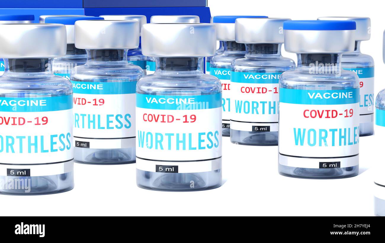 Covid worthless - vaccine bottles with an English label Worthless that symbolize a big human achievement that may end the fight with the coronavirus p Stock Photo