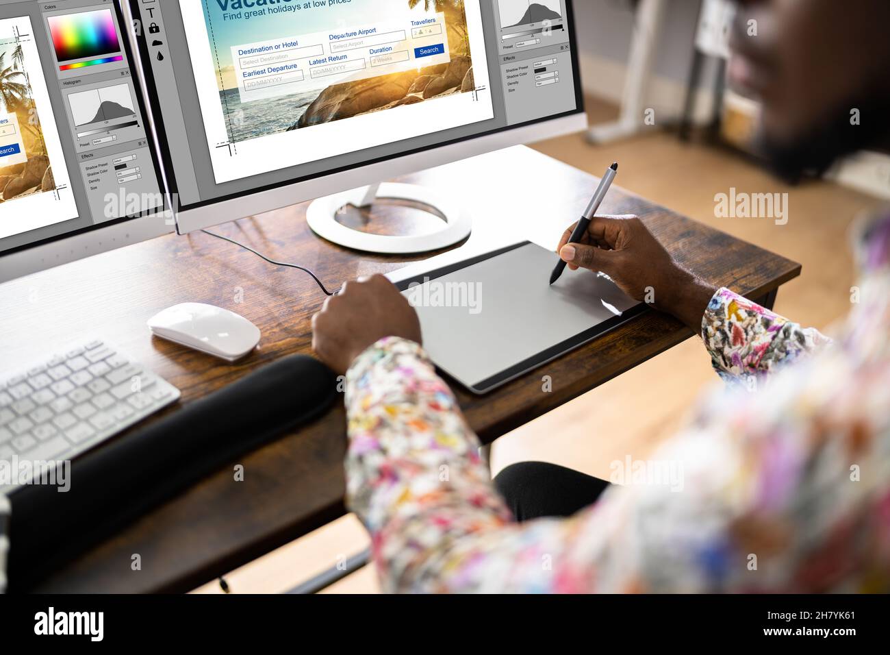 Graphic Designer Artist Working On Multiple Computer Screens Stock