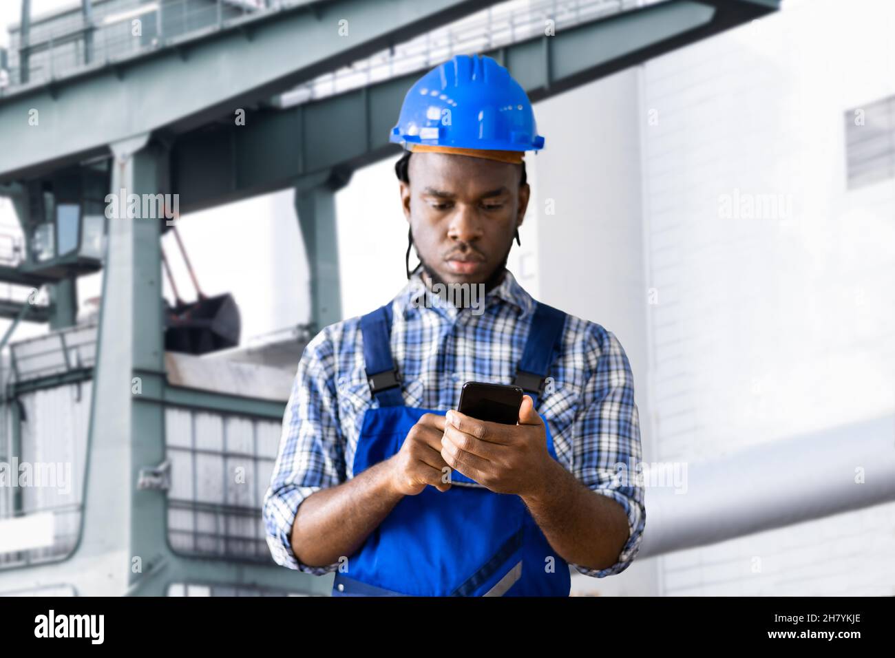 Industrial Engineer Male Person Using Technology. Inspector At Site Stock Photo