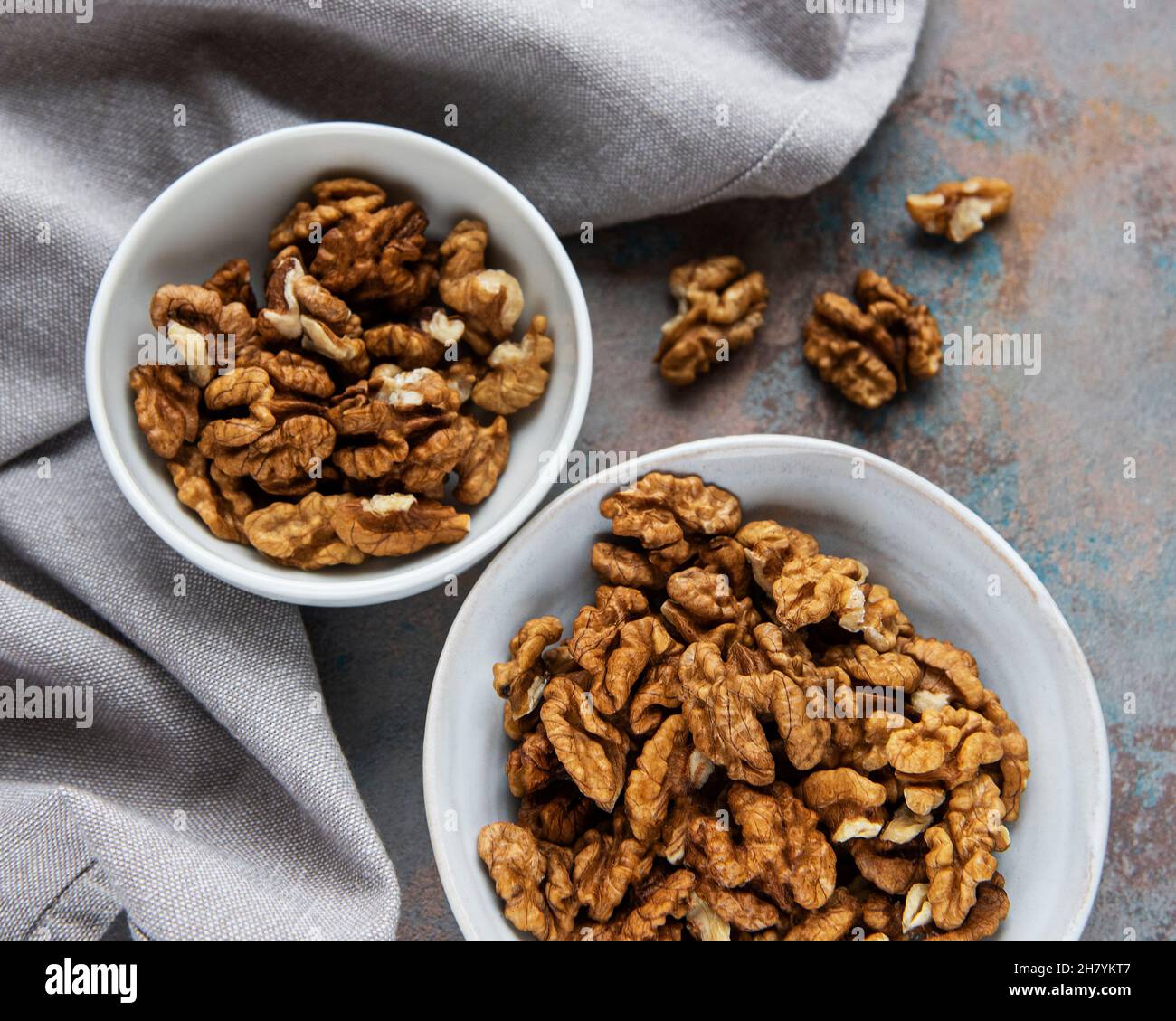 Walnuts  without shell on a concrete background Stock Photo