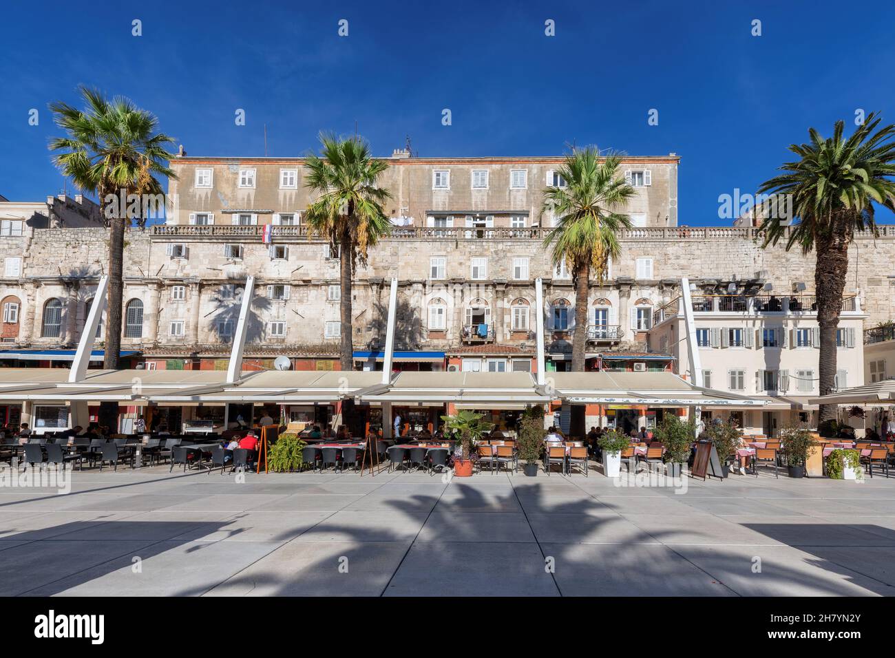 Café and restaurant in Riva promenade, Split, Croatia. Stock Photo