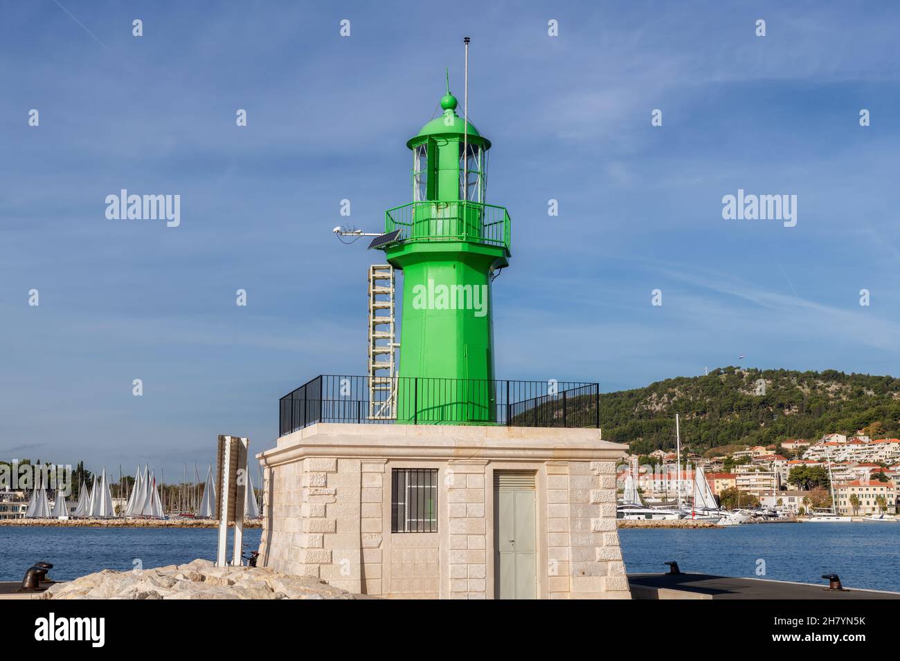 Green Split Lighthouse in port in Adriatic sea coast, Split, Croatia. Stock Photo