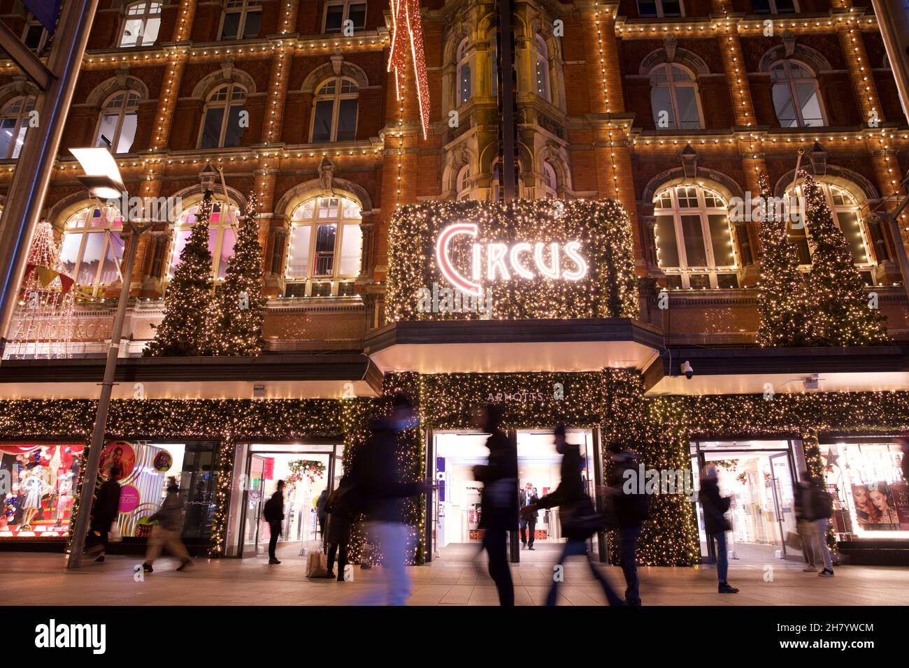 Dublin, Ireland November 24, 2021 shoppers pass the circus themed