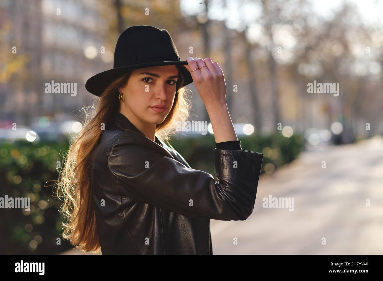 Woman posing outdoors hi-res stock photography and images - Alamy