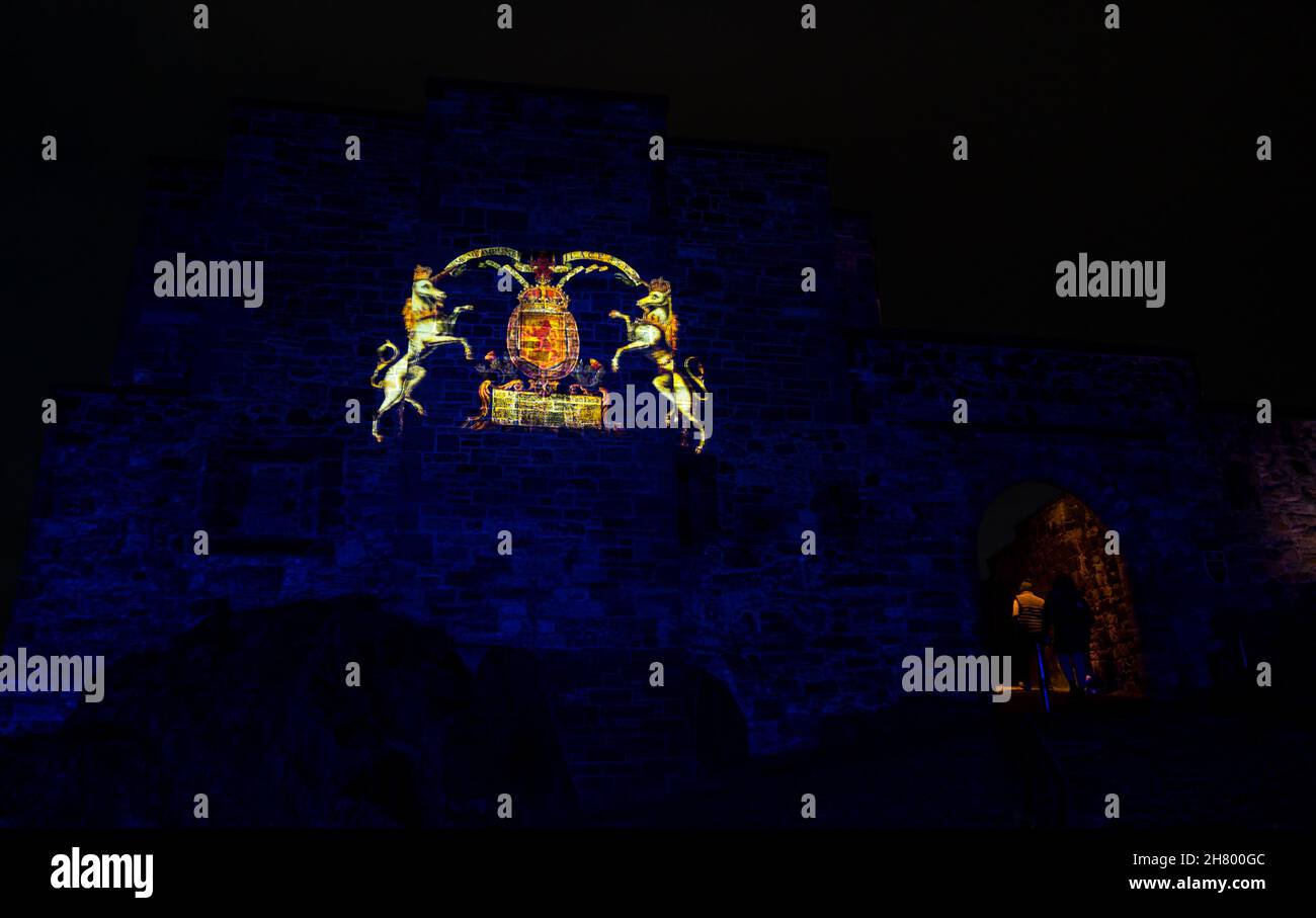 Castle of Light image projection of unicorns with royal coat of arms, Edinburgh castle, Scotland, UK Stock Photo