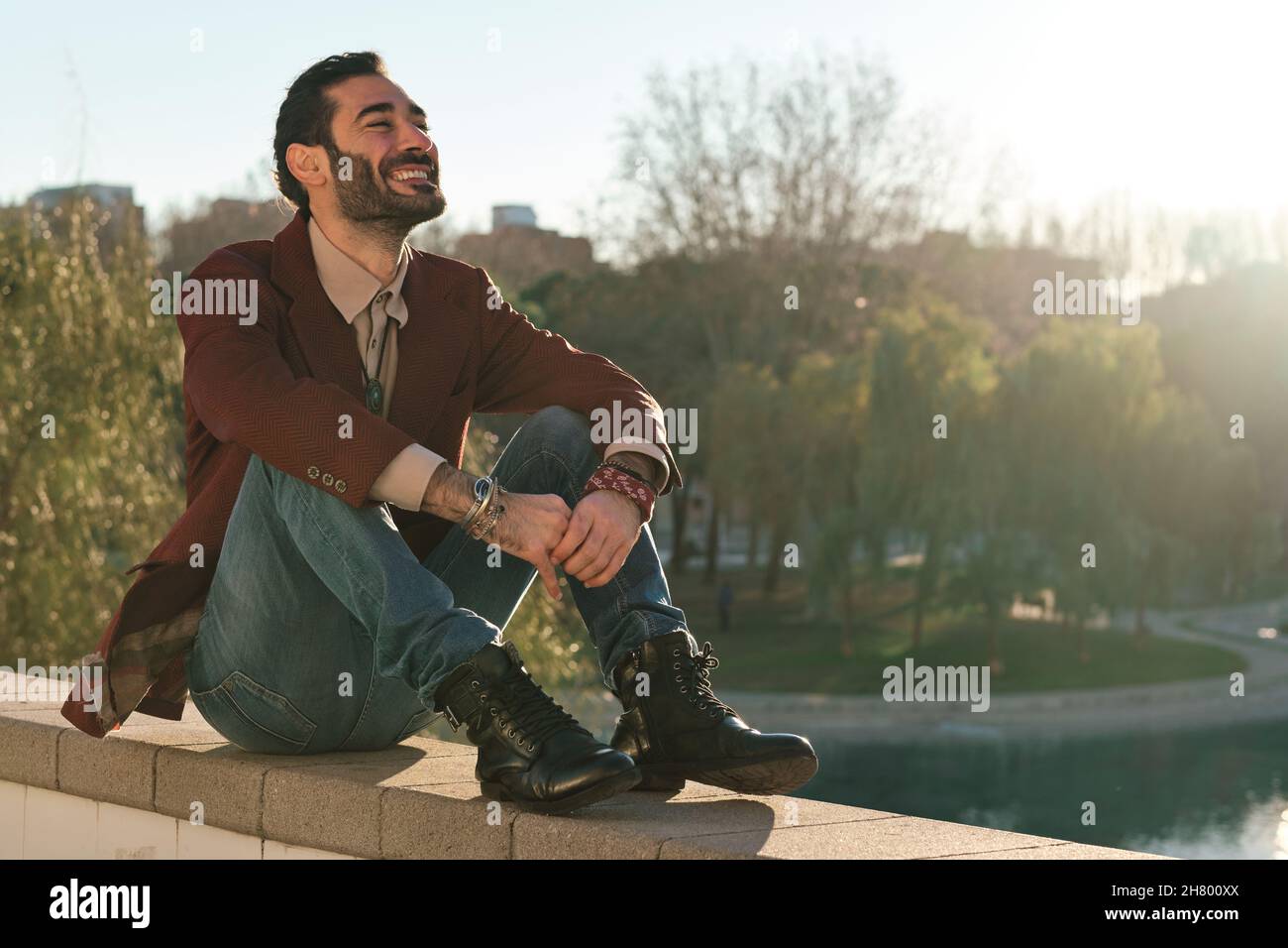Smiling man outside in nature hi-res stock photography and images - Alamy