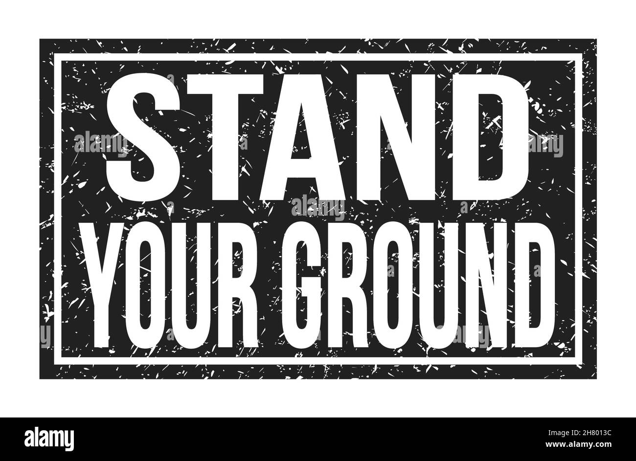 STAND YOUR GROUND, words written on black rectangle stamp sign Stock