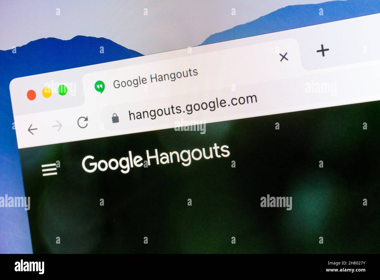 Close-up of Google Hangouts logo on computer screen in browser Stock Photo