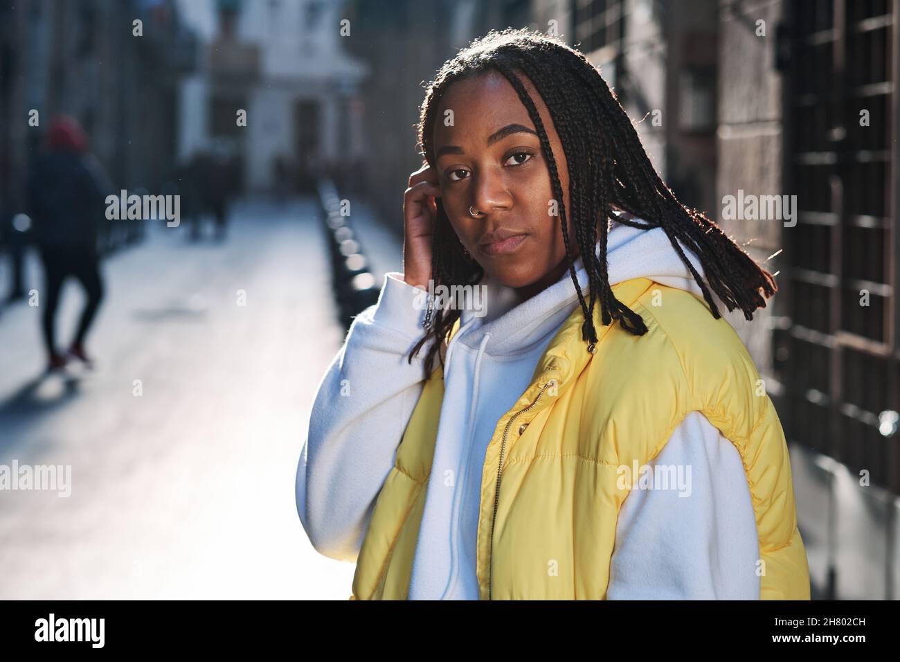 Woman standing outdoors hi-res stock photography and images - Alamy