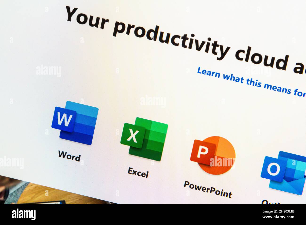 Microsoft website with icons of office suite (Word, Excel, Powerpoint, Outlook, Teams) on computer screen in browser Stock Photo