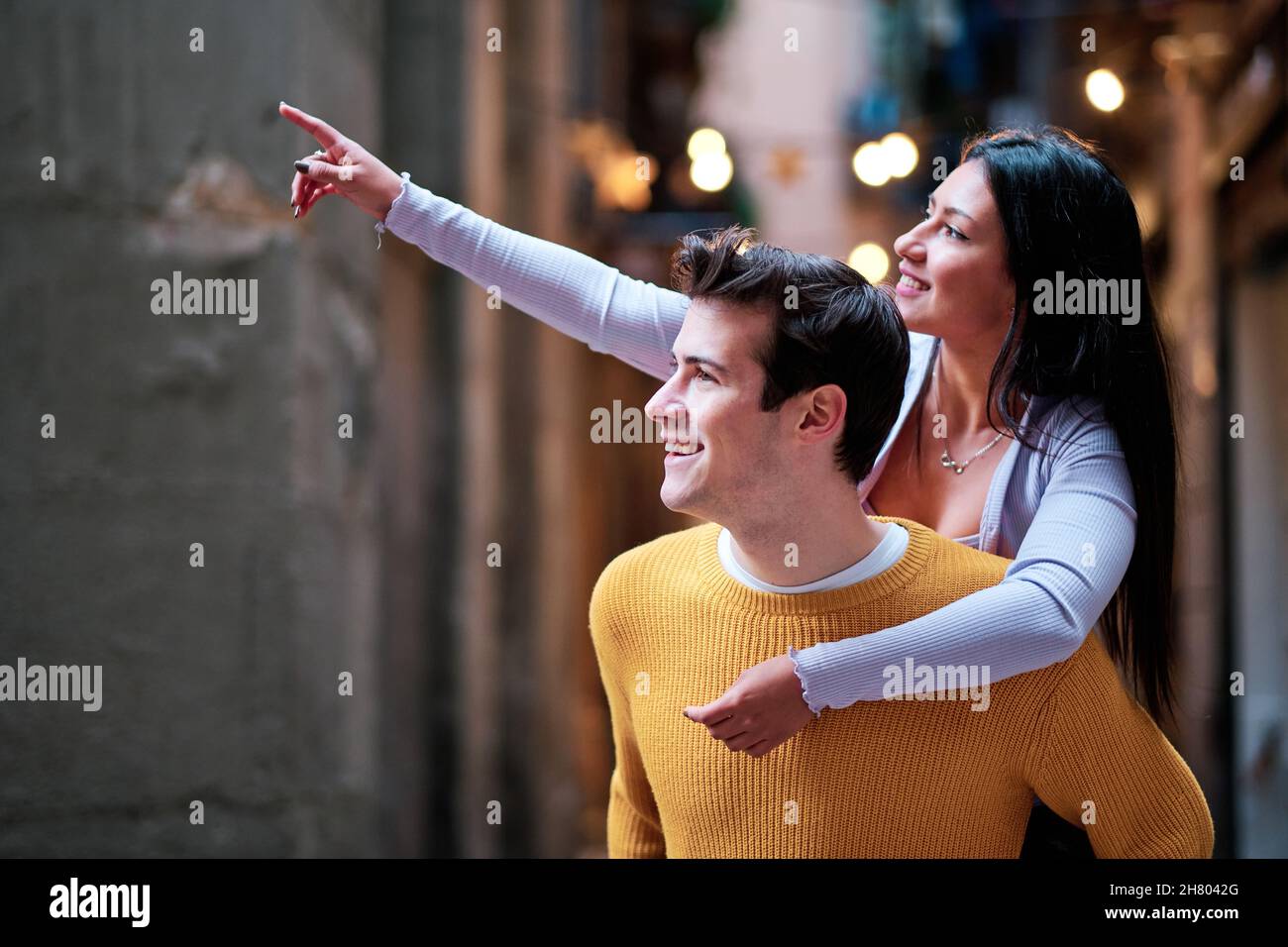 Young couple having fun on a date together outdoors Stock Photo - Alamy