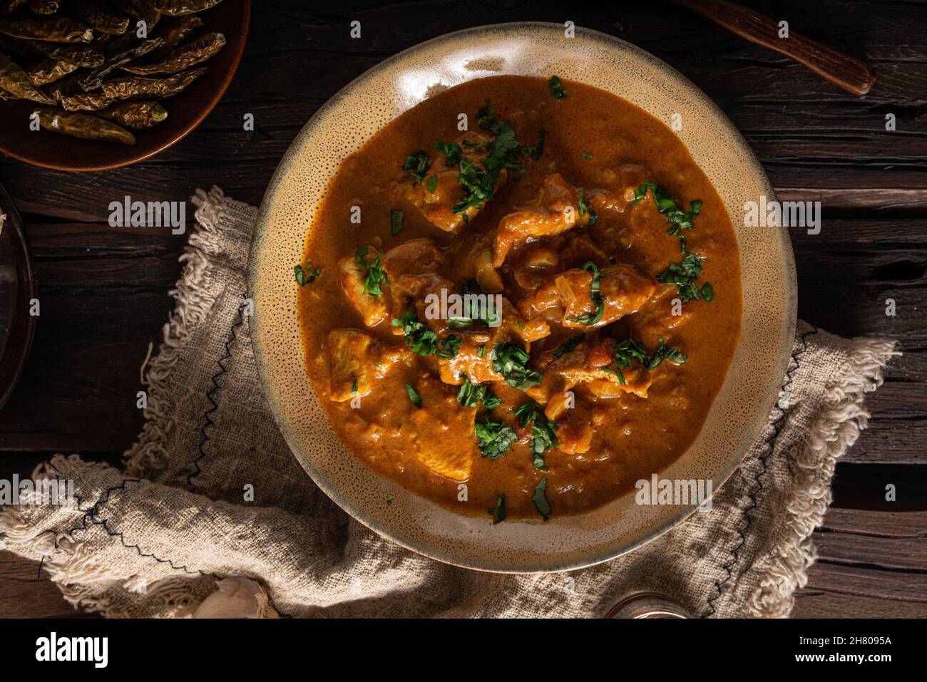https://c8.alamy.com/comp/2H8095A/original-chicken-curry-with-spicy-jalapeno-peppers-2H8095A.jpg