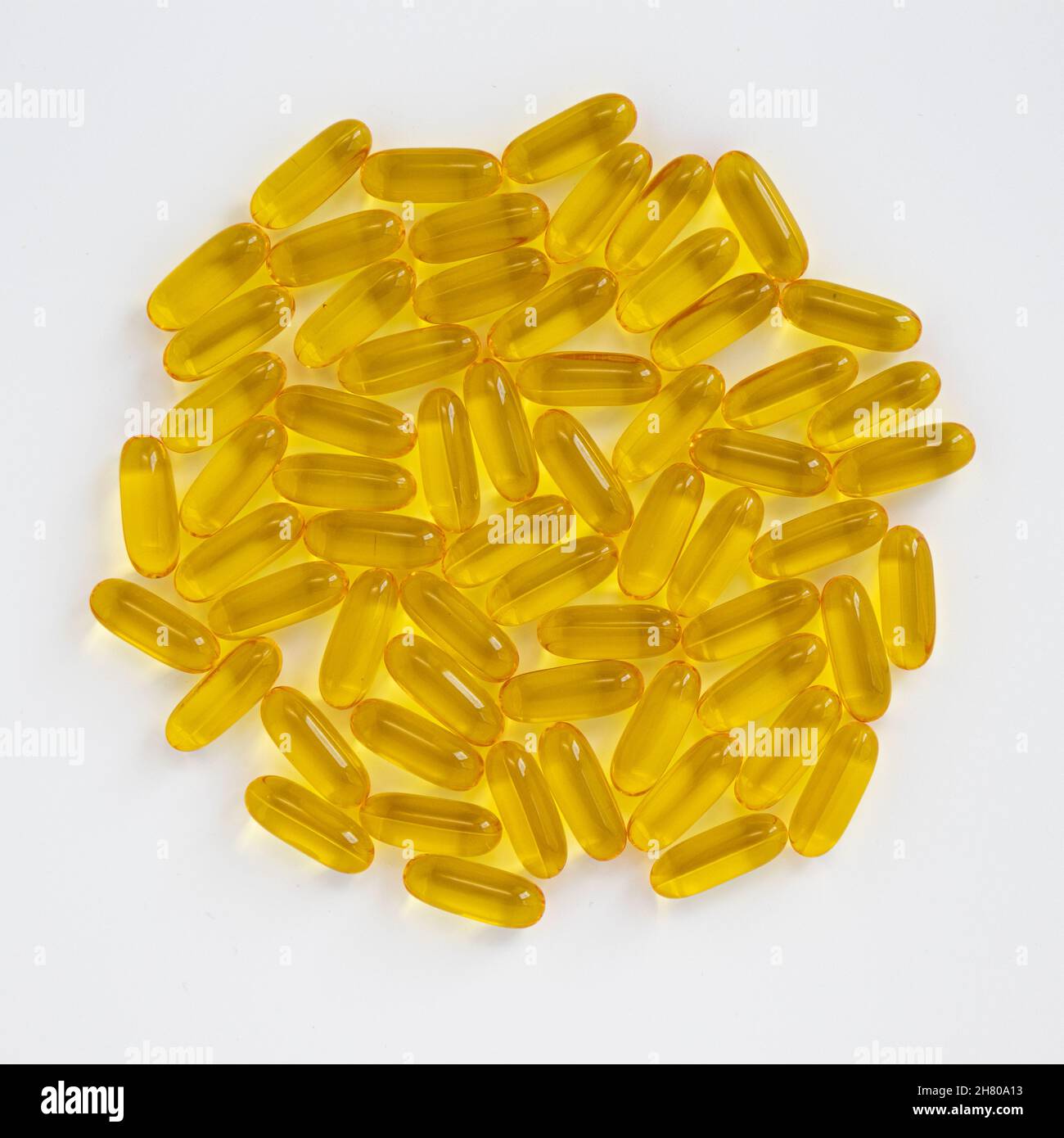 fish oil pills isolated on white background, close up of food supplement oil filled capsules suitable for fish oil, omega 3, omega 6, omega 9, health Stock Photo