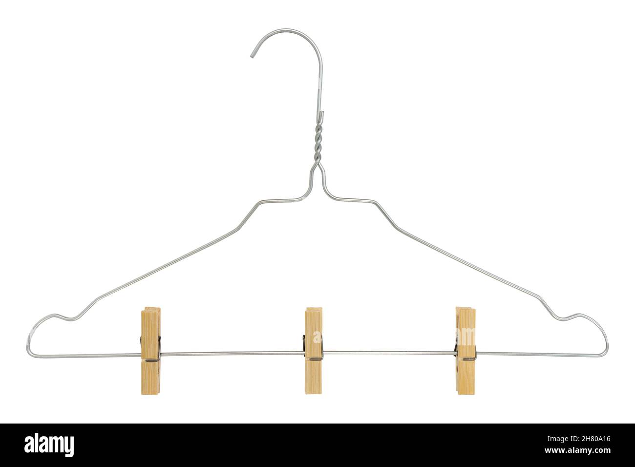 metal coat hanger with clothespins isolated on white background, clothes pegs clamped to hanger Stock Photo