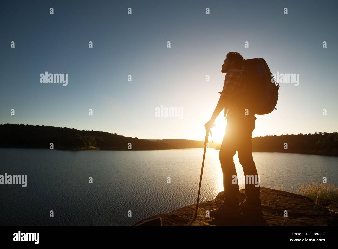 Male hiker relaxing sunset hi-res stock photography and images - Alamy