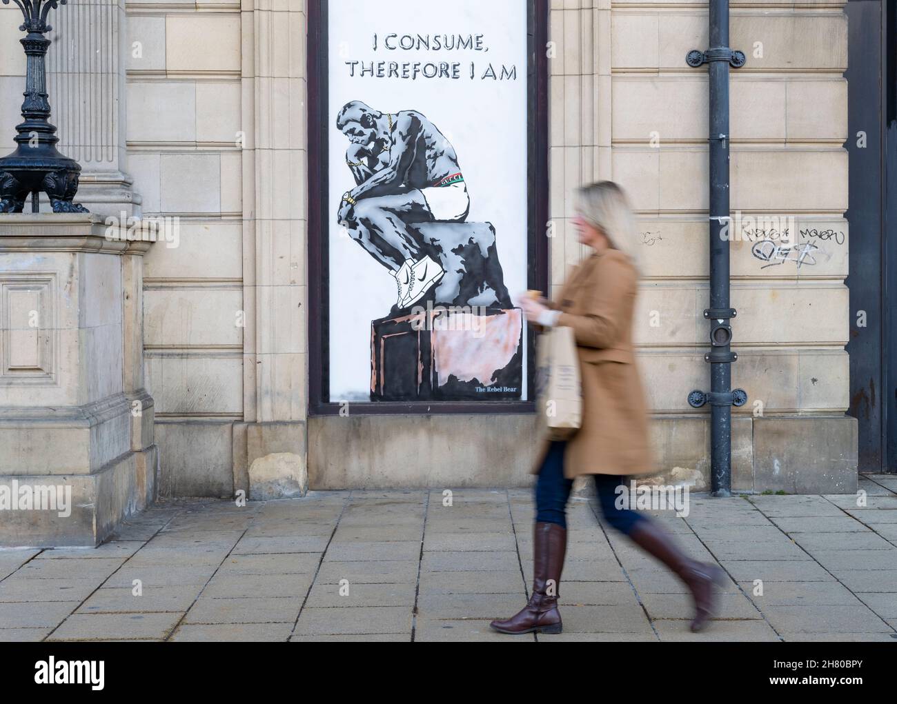Edinburgh, Scotland, UK. 26th November 2021. On opening day of Black Friday sales new street art by Rebel Bear has appeared in Edinburgh city centre. The street art with the message “I consume therefore I am “ seems to mock the importance of the modern consumerism culture. Iain Masterton/Alamy Live News. Stock Photo