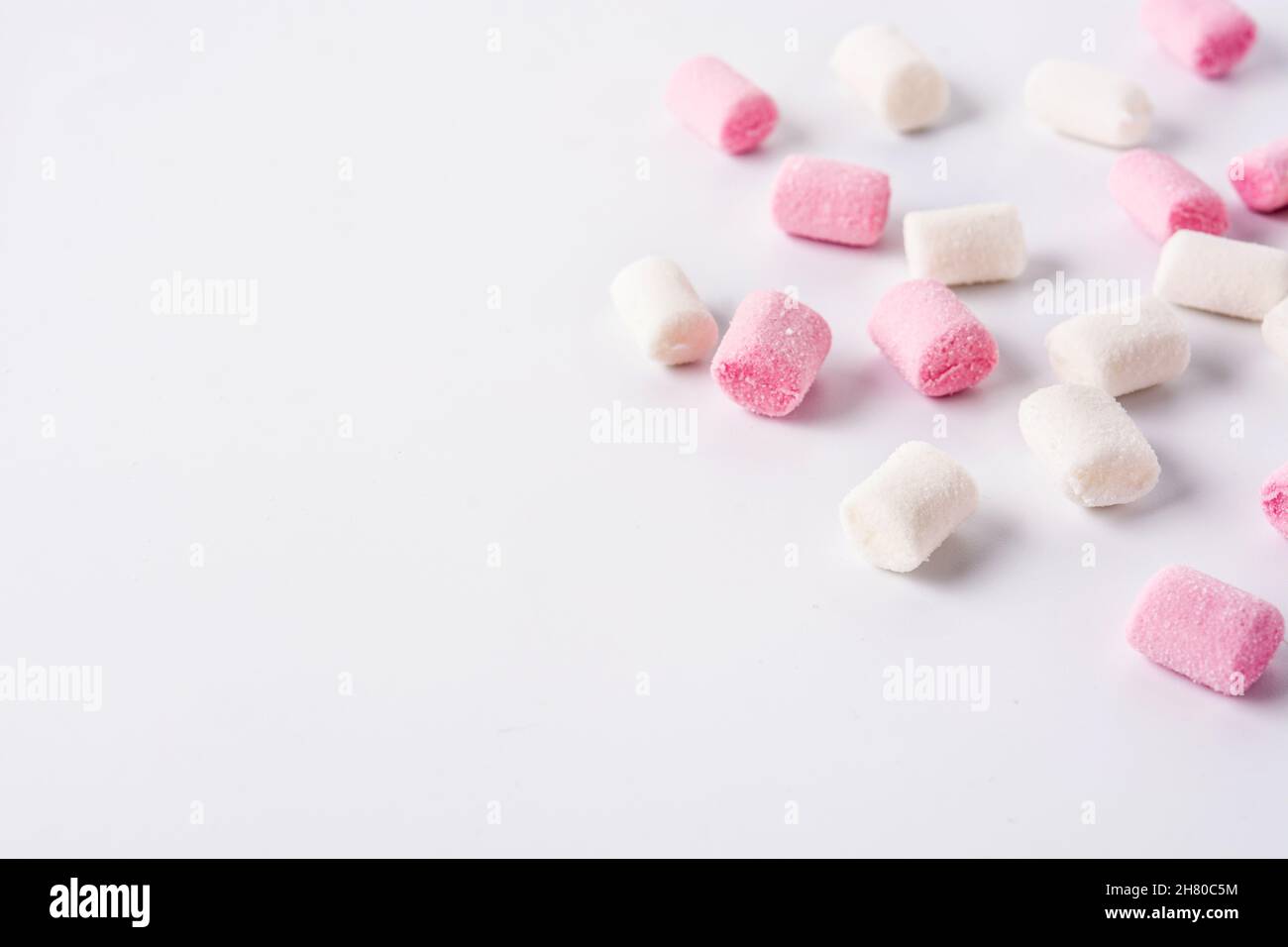 Sweet marshmallows topping isolated on white background Stock Photo - Alamy
