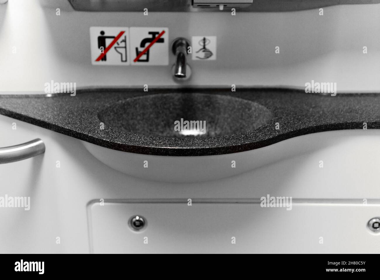 Sverdlovsk Oblast, Russia - November 05, 2021: sink with a tap in the toilet room of a passenger train Stock Photo