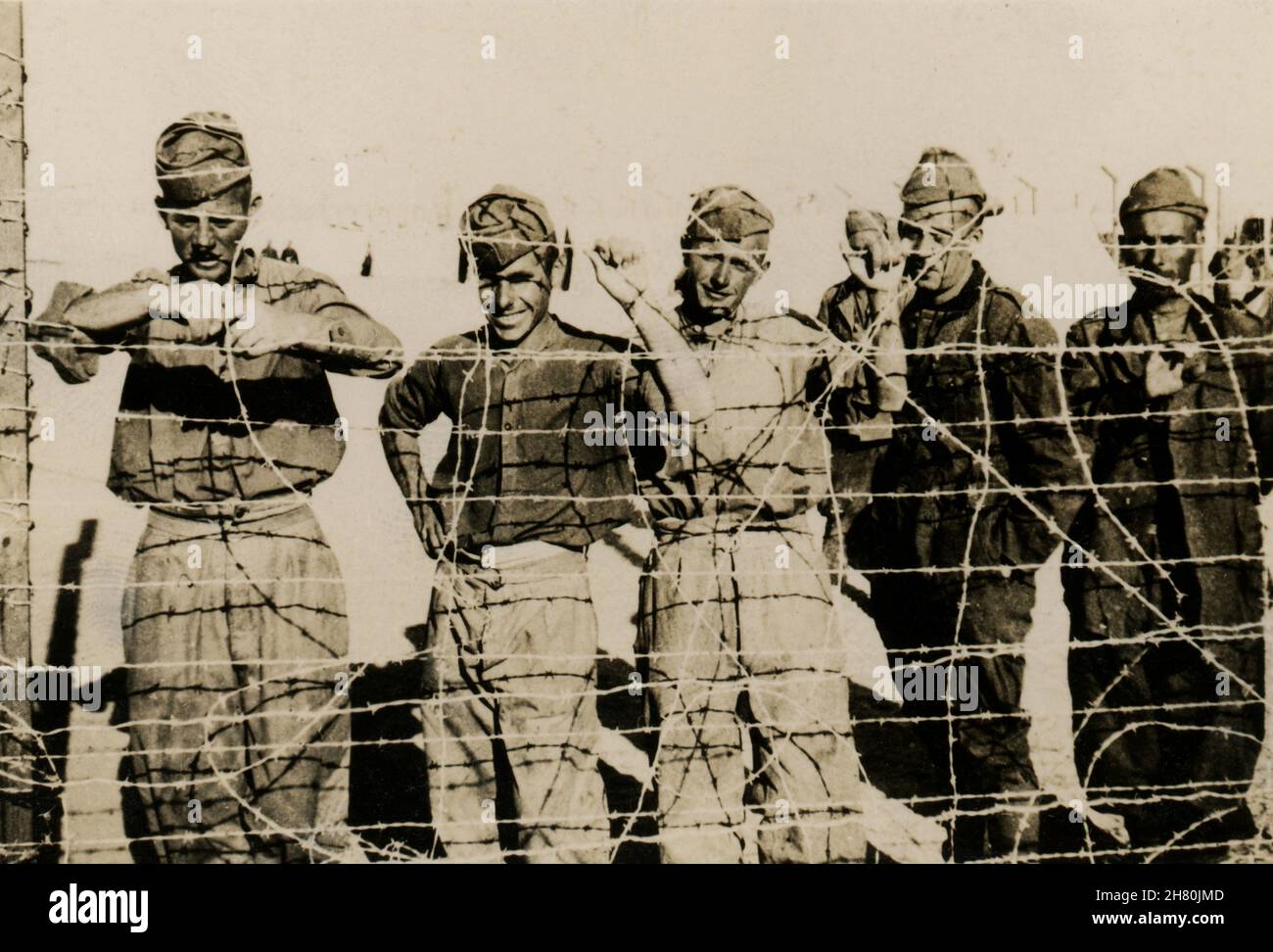 The photo's original caption is ' Italian prisoners'. It was taken by a British Army soldier who fought in Egypt, Libya, Tunisia and Italy from 1941-1945. Stock Photo