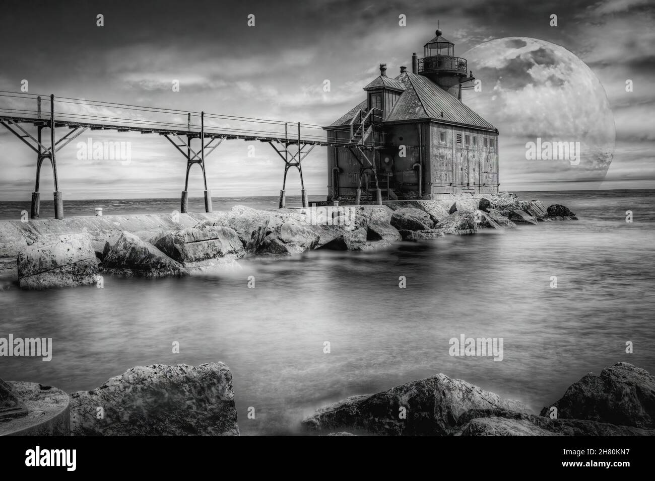This is the Coast Guard lighthouse and breakwall at the east entrance to the Sturgeon Bay hipping canal that connects Green Bay to Lake Michigan in Wi Stock Photo