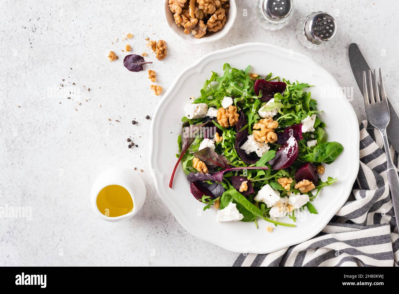Healthy Beet Salad With Walnuts And Goat Cheese On Plate Garnished With