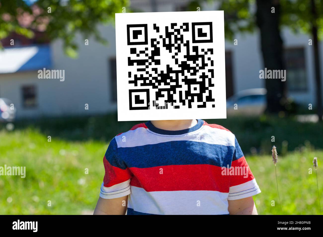 qr code on the child's face. High quality photo Stock Photo - Alamy
