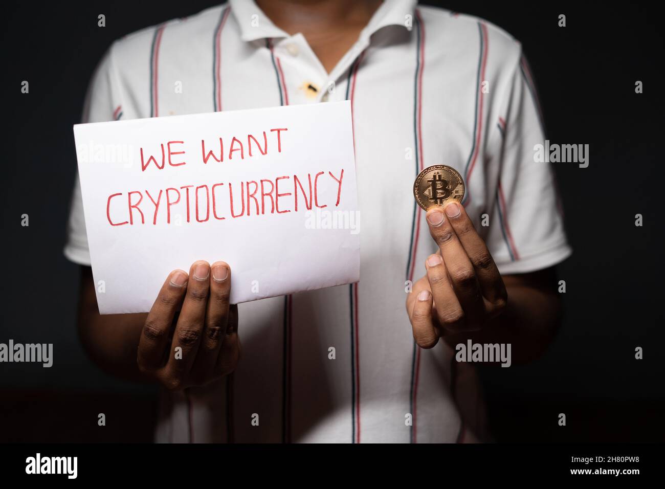 Maski, India - 26 November, 2021 : Concept of Cryptocurrency or bitcoin  supporter showing by unrecognizable man with bitcoin and we want Stock  Photo - Alamy