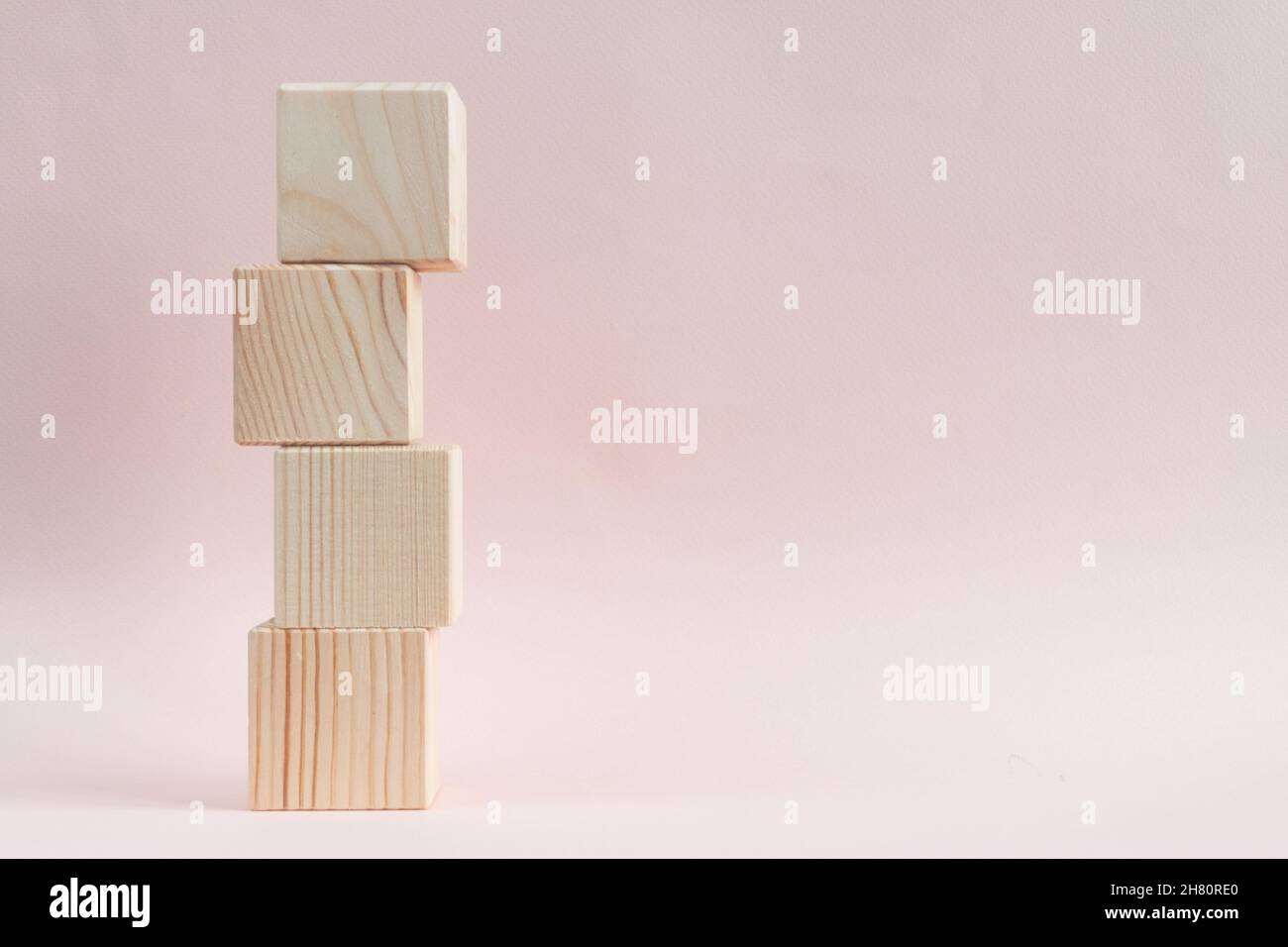 Wooden cubes pyramid, template for greeting card Stock Photo - Alamy