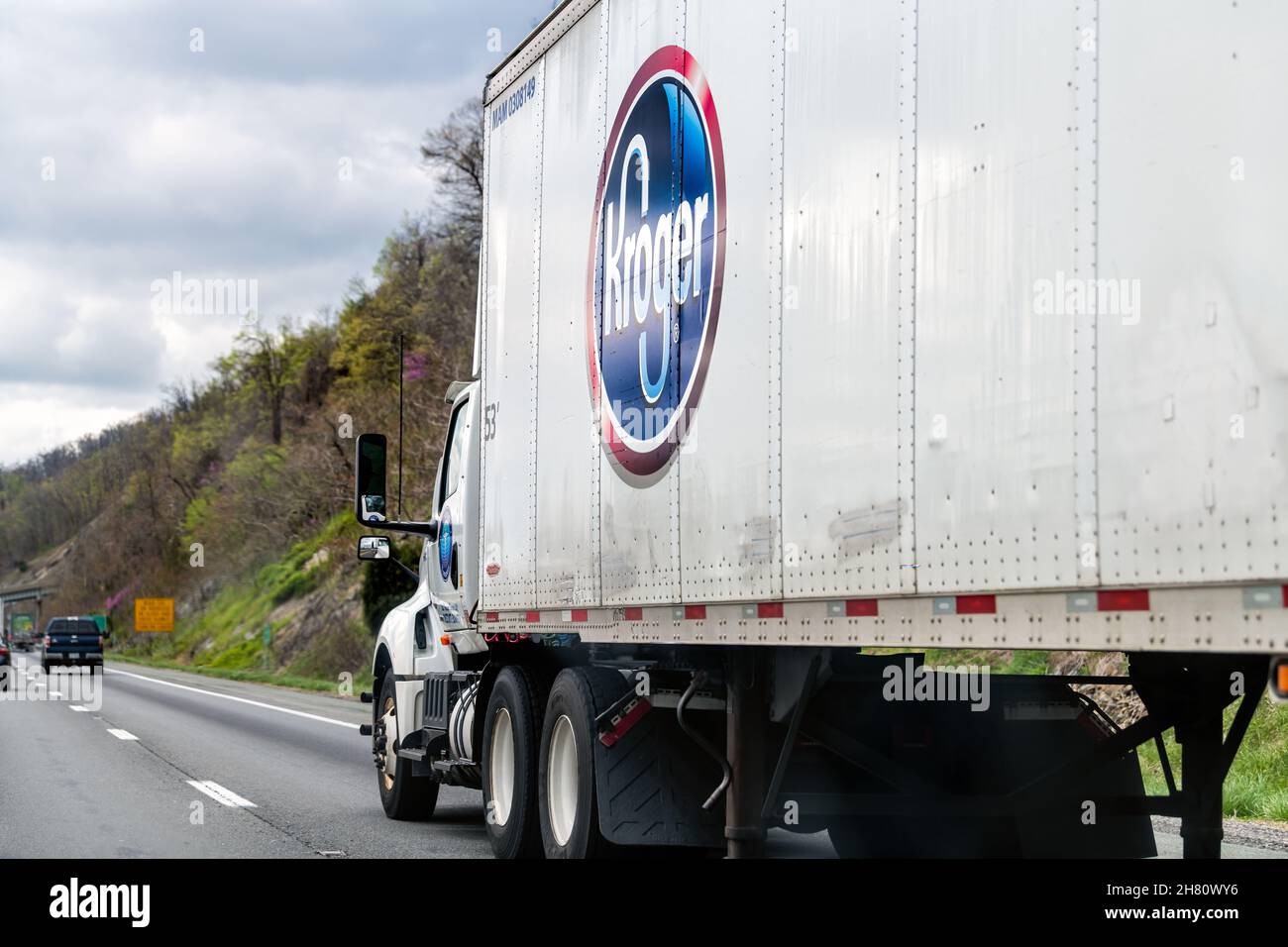 Charlottesville, USA - April 15, 2021: Highway road in Virginia with Kroger delivery shipping cargo truck in traffic closeup of logo on side of vehicl Stock Photo