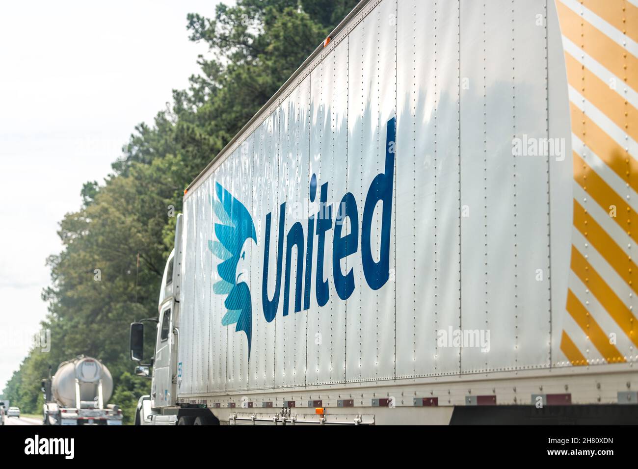 Orangeburg, USA - July 6, 2021: Interstate highway i26 26 in South Carolina with large truck sign container for United Van Lines moving company logo w Stock Photo