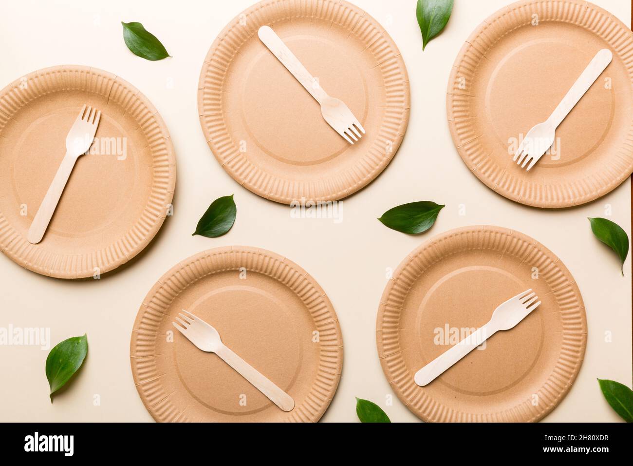 set of empty reusable disposable eco-friendly plates, cups, utensils on  light white colored table background. top view. Biodegradable craft dishes.  Re Stock Photo - Alamy