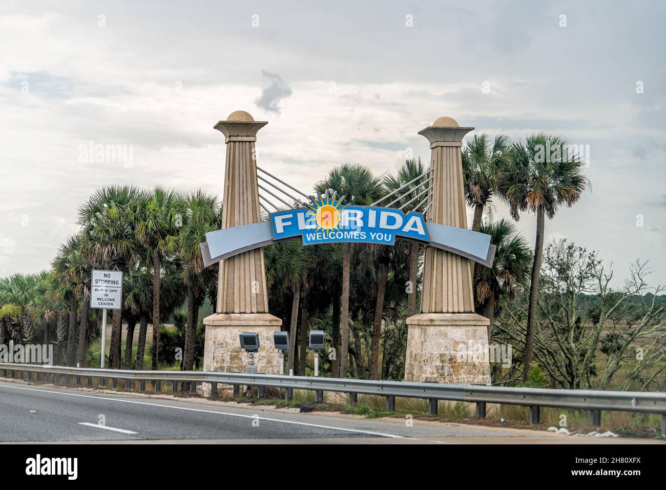 Yulee, USA - July 6, 2021: Interstate highway i95 driving car pov from Georgia state line and colorful sign on roadside for Florida welcomes you with Stock Photo
