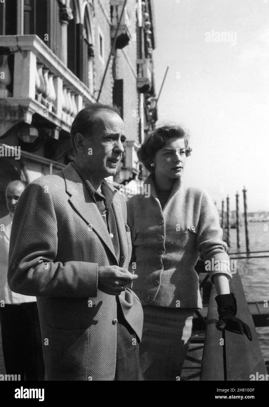HUMPHREY BOGART and his Wife LAUREN BACALL in Venice, Italy in March 1954 following completion of his latest film THE BAREFOOT CONTESSA with Ava Gardner Stock Photo