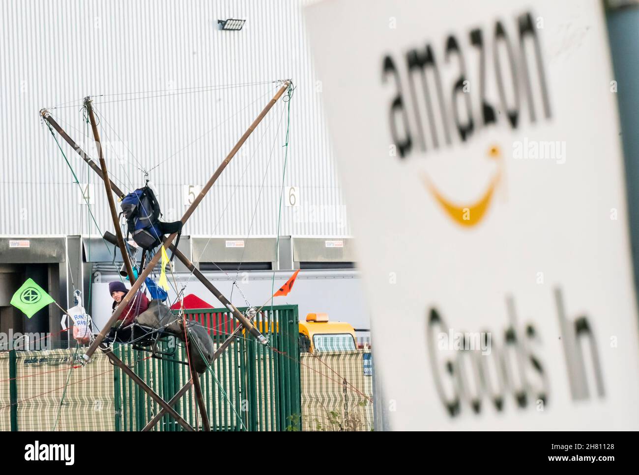 Activists from Extinction Rebellion block the entrance to the Amazon ...
