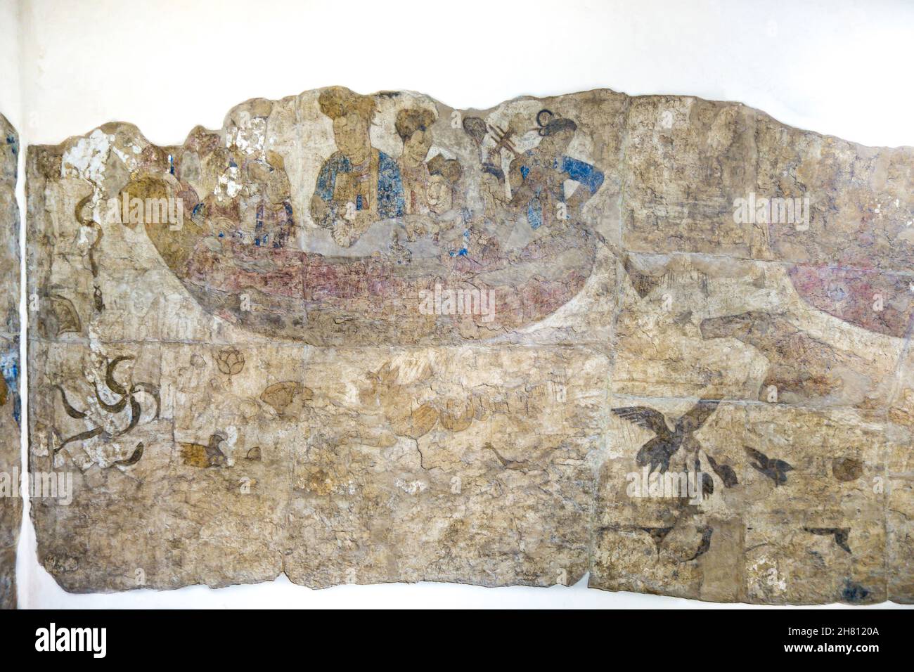 Ancient Central Asian fresco of VI-VIII from Ishhid palace. It depicts pleasure trip of noble people in boat, river animals and birds. Afrasiab Museum Stock Photo