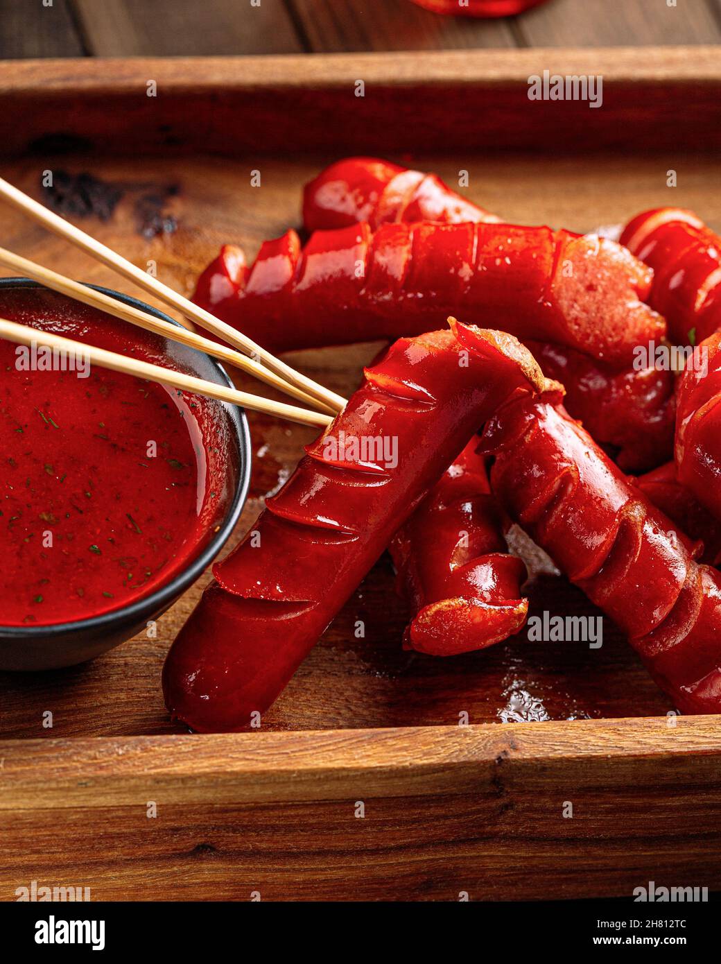 Bar appetizer beer hunting sausages with sauce Stock Photo Alamy