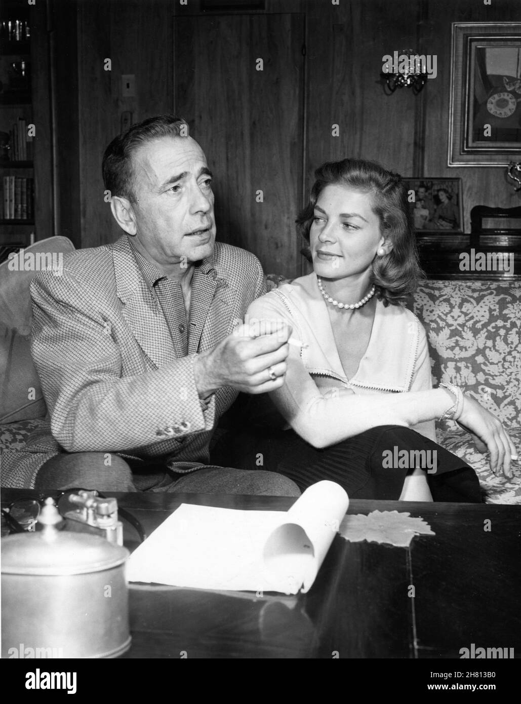HUMPHREY BOGART and LAUREN BACALL candid at home with script for their ...