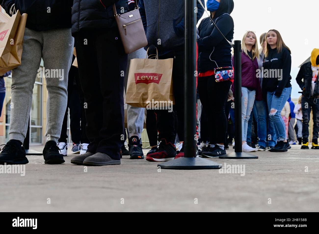 Shoppers wait in line to enter stores as Black Friday sales begin at The  Outlet Shoppes of the Bluegrass in Simpsonville, Kentucky, U.S., November  26, 2021. REUTERS/Jon Cherry Stock Photo - Alamy