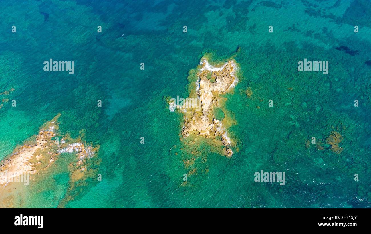 A small island View from above coast taken by a drone. Stock Photo