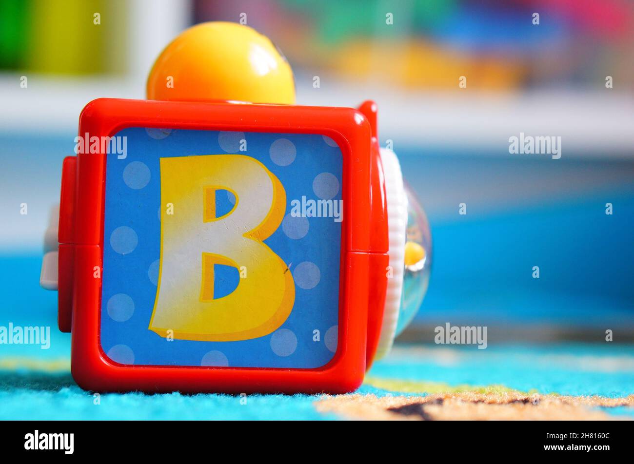 POZNAN, POLAND - Feb 28, 2016: A closeup of a Fisher-Price brand toy block with the letter B Stock Photo