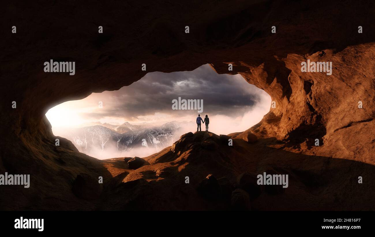 Man and Woman Hiker holding hands in a rocky cave Stock Photo - Alamy