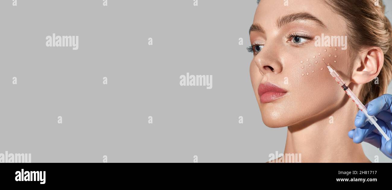 Biorevitalization procedure. Pretty woman while beauty injections with