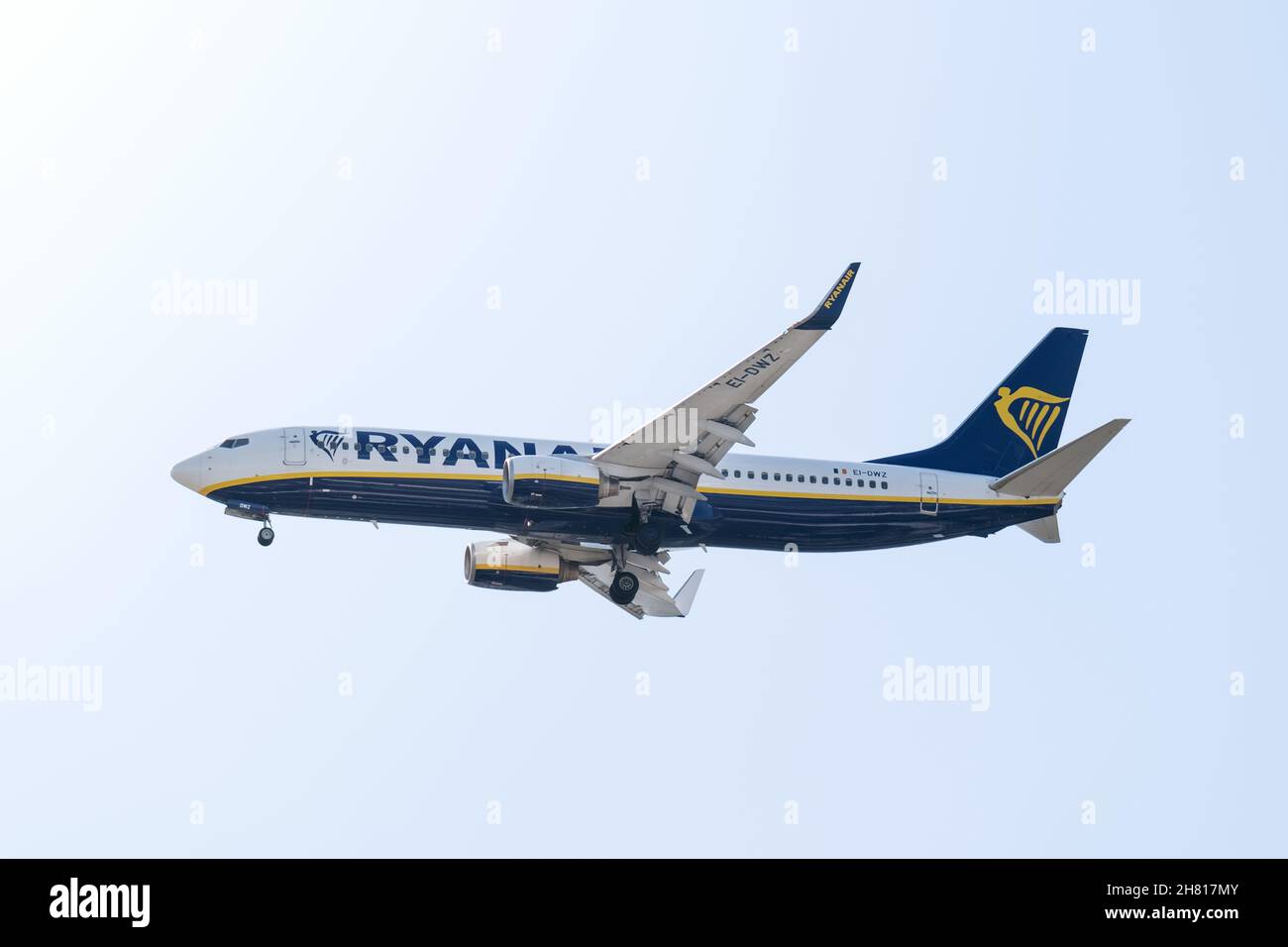 Picture of Boeing 737-8AS Ryanair EI-DWZ with landing gear down, preparing for landing Stock Photo
