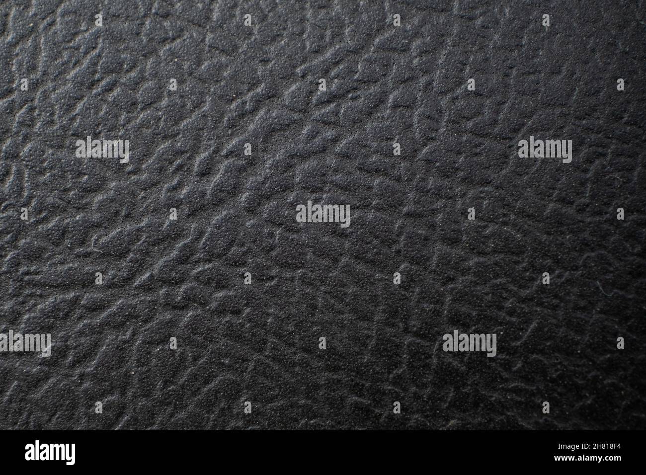 dark embossed skin texture, black leather background Stock Photo - Alamy