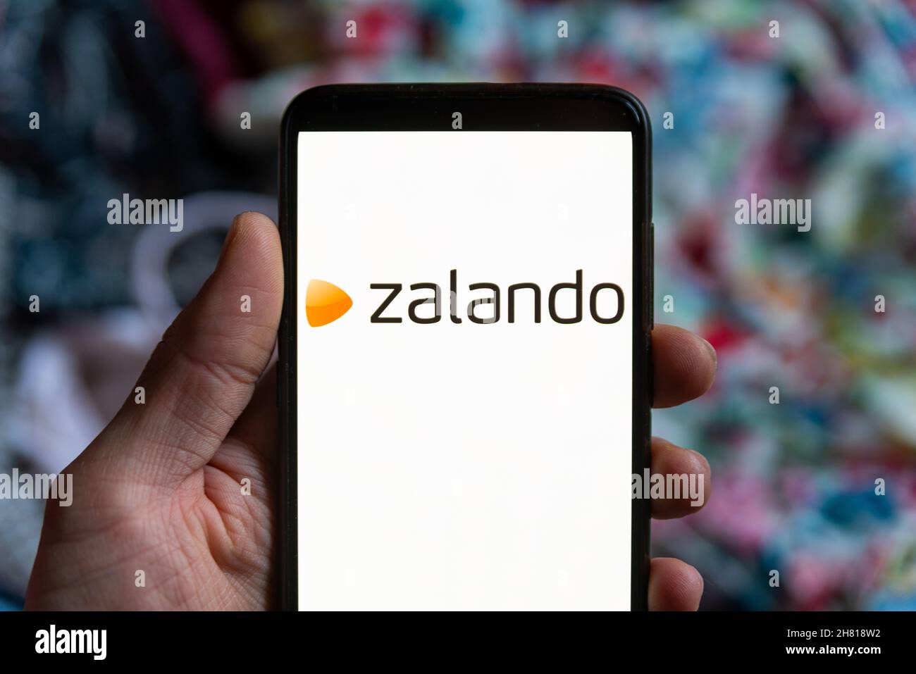 The fashion retailer Zalando mobile app logo is seen on the screen of a mobile  phone in Barcelona, Spain on November 26, 2021. Online shopping is very  popular among millennials and constantly