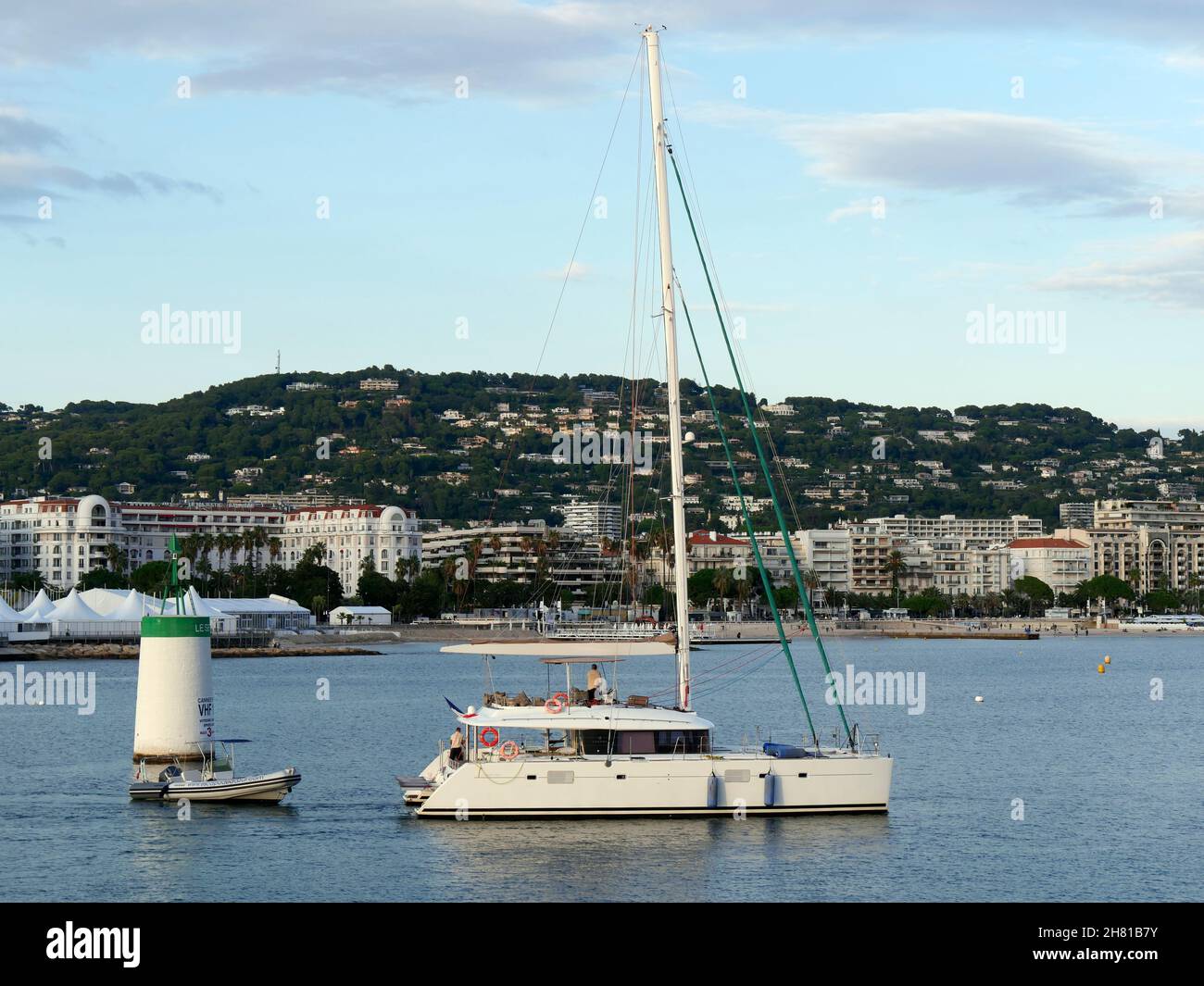 large Lagoon 560 catamaran yacht leaving the marina at Cannes, Alpes-Maritimes,France Stock Photo