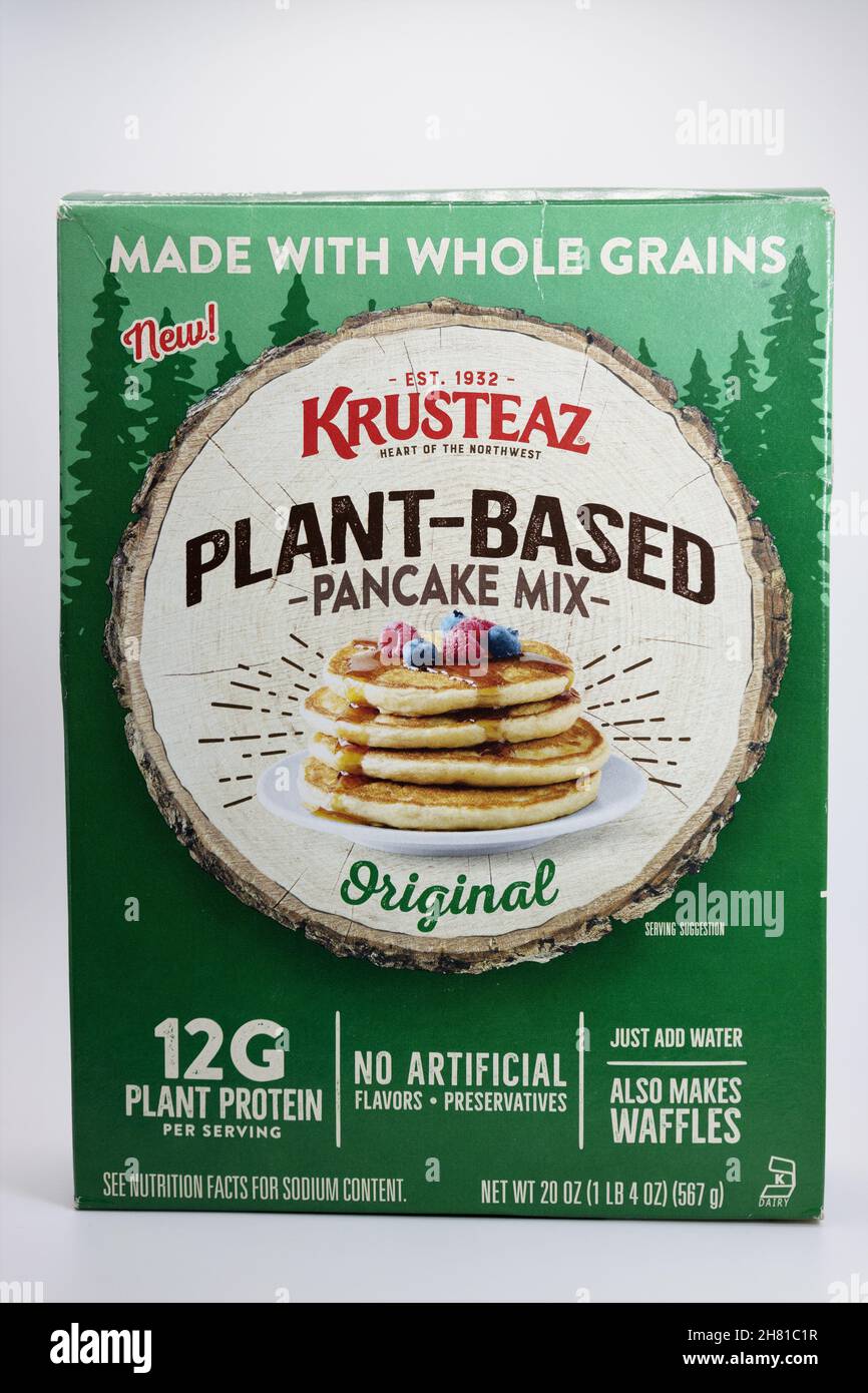 A box of Krusteaz brand plantbased pancake mix on a white background