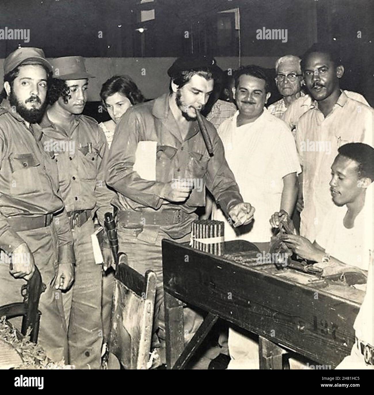 Che Guevara Buying A Cigar, Cuba, 1960s Stock Photo