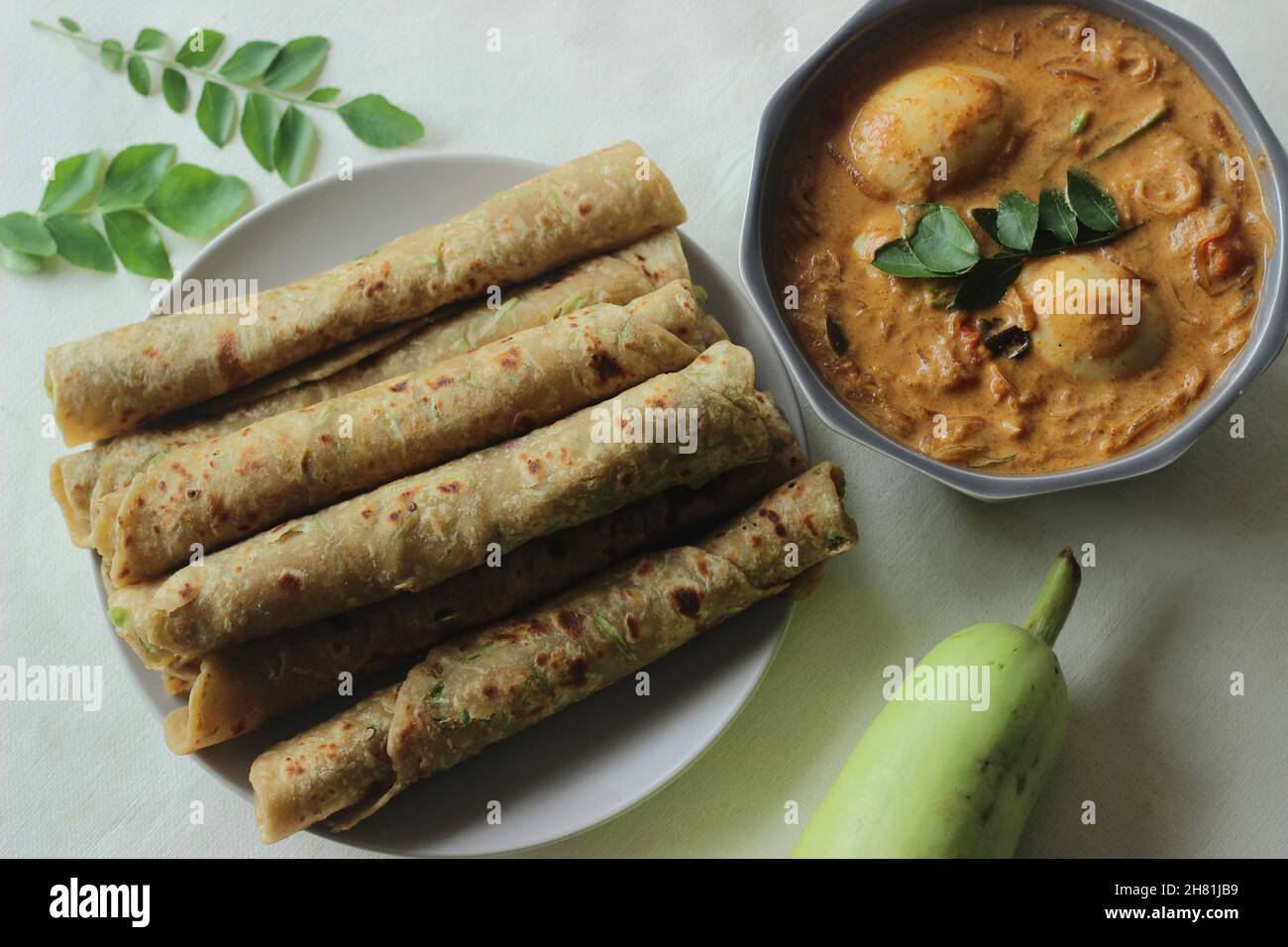 Indian flat bread made of whole wheat flour, grated bottle guard, yogurt and spices served with